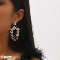 1 Pair Modern Style Simple Style Shiny Flower Chain Inlay Alloy Rhinestones Drop Earrings main image 1