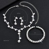 Moda Flor Cobre Embutido Perla Artificial Diamante De Imitación Pulsera Aretes Collar sku image 2