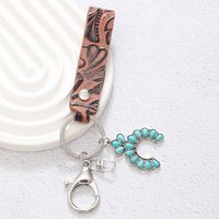 Simple Style Cactus Leaf Dreamcatcher Pu Leather Alloy Turquoise Bag Pendant Keychain main image 6