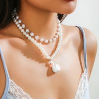 Elegant Retro Geometric Round Swan Arylic Imitation Pearl Acrylic Alloy Tassel Women's Necklace sku image 1