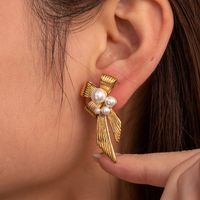 1 Pair Vintage Style Simple Style C Shape Water Droplets Bow Knot Plating Inlay Stainless Steel Pearl Zircon 18k Gold Plated Ear Studs main image 4