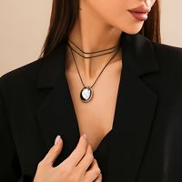 Casual Simple Style Classic Style Oval Alloy Leather Wax Line Layered Tassel Straps Alloy Tassel Women's Pendant Necklace main image 3