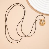 Casual Simple Style Classic Style Oval Alloy Leather Wax Line Layered Tassel Straps Alloy Tassel Women's Pendant Necklace main image 4