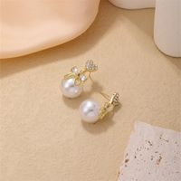 1 Piece Simple Style Heart Shape Bow Knot Plating Inlay Copper Pearl Zircon Gold Plated Ear Studs main image 1