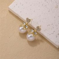 1 Piece Simple Style Heart Shape Bow Knot Plating Inlay Copper Pearl Zircon Gold Plated Ear Studs main image 3