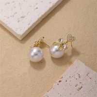1 Piece Simple Style Heart Shape Bow Knot Plating Inlay Copper Pearl Zircon Gold Plated Ear Studs main image 5