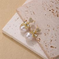 1 Piece Simple Style Heart Shape Bow Knot Plating Inlay Copper Pearl Zircon Gold Plated Ear Studs main image 6