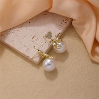 1 Piece Simple Style Heart Shape Bow Knot Plating Inlay Copper Pearl Zircon Gold Plated Ear Studs main image 4