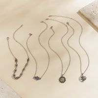 Wholesale Jewelry Retro Exaggerated Bohemian Sun Gloves Moon Alloy Iron Layered Tassel Chain Pendant Necklace main image 4