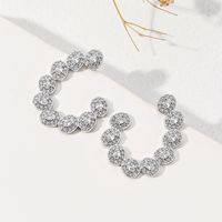 1 Paire Style Moderne Commuer Forme C Incruster Le Cuivre Zircon Boucles D'oreilles main image 1