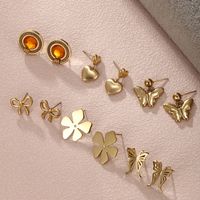 1 Pair XUPING Simple Style Circle Heart Shape Bow Knot 304 Stainless Steel Artificial Gemstones 18K Gold Plated Ear Studs main image 1