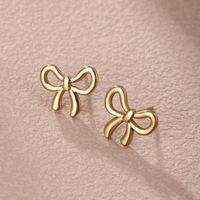 1 Pair XUPING Simple Style Circle Heart Shape Bow Knot 304 Stainless Steel Artificial Gemstones 18K Gold Plated Ear Studs main image 6