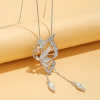 Elegant Butterfly Alloy Copper Plating Inlay Artificial Crystal Artificial Rhinestones Opal Women's Sweater Chain main image 1