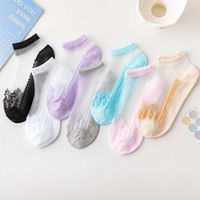 Women's Simple Style Classic Style Solid Color Holiday Daily Transparent Hollow Out Socks main image 1