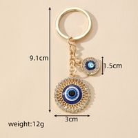 Casual Vintage Style Simple Style Devil's Eye Heart Shape Alloy Inlay Rhinestones Bag Pendant Keychain main image 3