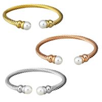 Simple Style Geometric Stainless Steel Plating Inlay Artificial Pearls Gold Plated Twisted Cable Bracele Bangle main image 1