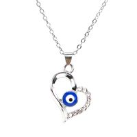 Ig Style Streetwear Devil's Eye Heart Shape Alloy Plating Hollow Out Inlay Rhinestones Women's Unisex Pendant Necklace main image 1