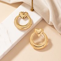 1 Pair Retro Commute Korean Style Heart Shape Solid Color Plating Hollow Out Alloy Gold Plated Ear Studs main image 1