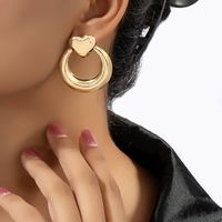 1 Pair Retro Commute Korean Style Heart Shape Solid Color Plating Hollow Out Alloy Gold Plated Ear Studs main image 4