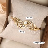 Glam Exaggerated Xuping Geometric Feather Alloy Plating Hollow Out Inlay Artificial Gemstones 14k Gold Plated White Gold Plated Women's Bangle main image 3