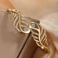 Glam Exaggerated Xuping Geometric Feather Alloy Plating Hollow Out Inlay Artificial Gemstones 14k Gold Plated White Gold Plated Women's Bangle main image 4