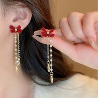 1 Pair Ig Style Sweet Bow Knot Plating Inlay Alloy Artificial Pearls Rhinestones Drop Earrings main image 3