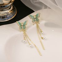 1 Pair Sweet Simple Style Butterfly Tassel Pearl Alloy Drop Earrings main image 8