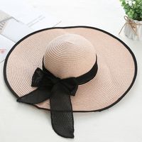 Women's Sweet Pastoral Solid Color Bowknot Big Eaves Straw Hat main image 4