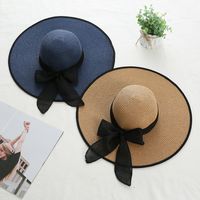 Women's Sweet Pastoral Solid Color Bowknot Big Eaves Straw Hat main image 1
