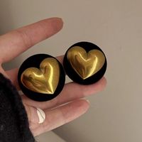 1 Pair Simple Style Heart Shape Arylic Alloy Ear Studs main image 1
