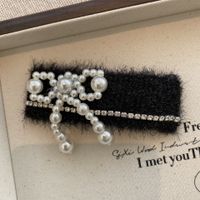 Women's Simple Style Bow Knot Imitation Pearl Handmade Hair Clip sku image 1