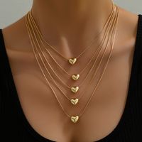 Simple Style Heart Shape Alloy Layered Plating Gold Plated Women's Layered Necklaces main image 4