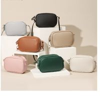 Mujeres Medio Cuero Sintético Color Sólido Estilo Clásico Oval Cremallera Bolsas De Hombro main image 1