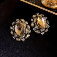 1 Pair Exaggerated Shiny Oval Hollow Out Inlay Alloy Artificial Gemstones Rhinestones Ear Studs main image 1