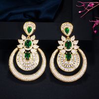 1 Paire Décontractée Brillant Géométrique Rond Placage Incruster Le Cuivre Zircon Plaqué Rhodium Plaqué Argent Boucles D'oreilles main image 3