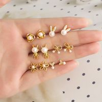 1 Pair Modern Style Simple Style Rabbit Flower Bow Knot Plating Inlay Copper Pearl Zircon 18k Gold Plated Ear Studs main image 1
