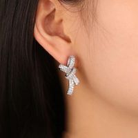 1 Pair Elegant Shiny Bow Knot Inlay Copper Zircon Ear Studs main image 4
