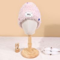 Women's Elegant Cute Solid Color Button Ear Warap Beanie Hat main image 6