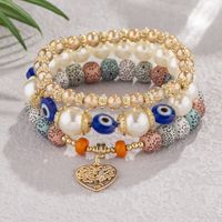 Retro Devil's Eye Tree Heart Shape Arylic Imitation Pearl Alloy Wholesale Bracelets main image 1