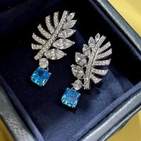 1 Paire Style Ig Brillant Feuilles Placage Incruster Le Cuivre Zircon Boucles D'oreilles main image 1