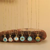 Vintage Style Simple Style Commute Triangle Round Eye Copper Enamel Plating Inlay Zircon 14k Gold Plated Pendant Necklace main image 1