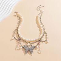 Wholesale Jewelry Simple Style Round Butterfly Imitation Pearl Alloy Iron Rhinestones Inlay Pendant Necklace main image 4