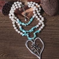 Simple Style Commute Heart Shape Imitation Pearl Alloy Turquoise Knitting Women's Three Layer Necklace main image 5