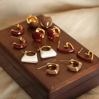 1 Pair Casual Simple Style Commute Bag Square Heart Shape Enamel Plating Titanium Steel 18k Gold Plated Earrings main image 4