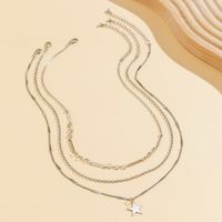 Simple Style Irregular Pentagram Copper Grommet Eyelet Chain Tassel Layered Necklaces main image 4