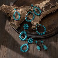 1 Pair Fashion Water Droplets Alloy Metal Plating Hollow Out Inlay Turquoise Women's Drop Earrings main image 4