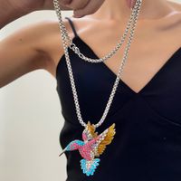 1 Pieza Estilo Nórdico Pájaro Aleación Embutido Diamante Artificial Chapado En Oro De 14 Quilates. Mujeres Collar Colgante main image 5