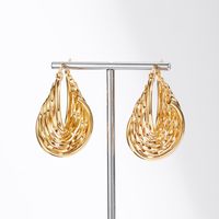 1 Pair Fashion U Shape Asymmetrical Plating Frill Stainless Steel 18k Gold Plated Hoop Earrings main image 5