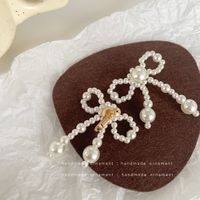 1 Paar Mode Bogenknoten Legierung Glas Perlen Überzug Frau Ohrclips Ohrringe sku image 3