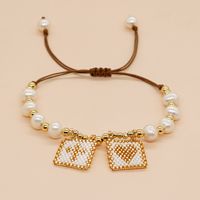 Einfacher Stil Kreuzen Herzform Süßwasserperle Saatperle Kupfer Perlen Armbänder sku image 2